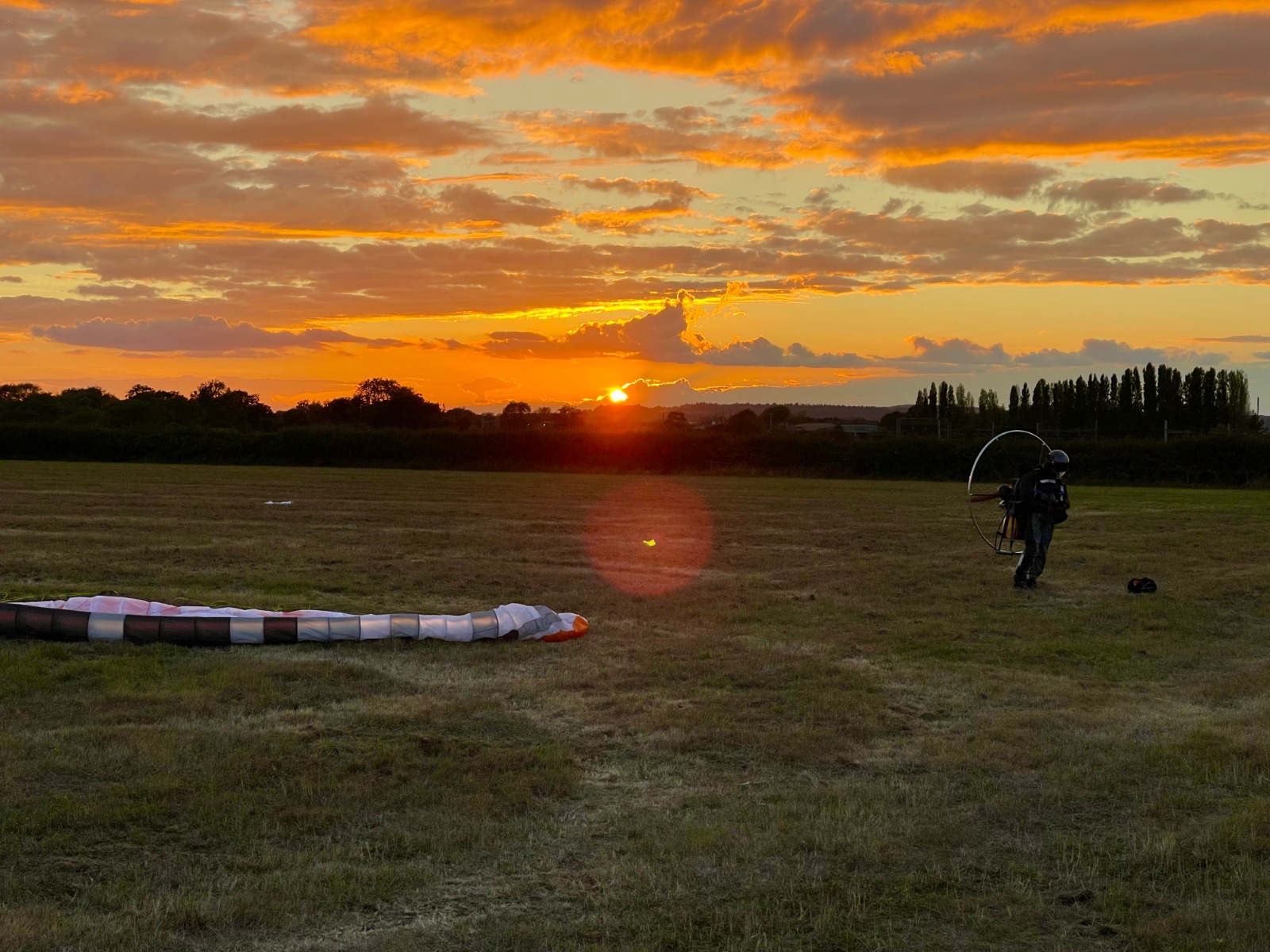 Paramotor over countryside